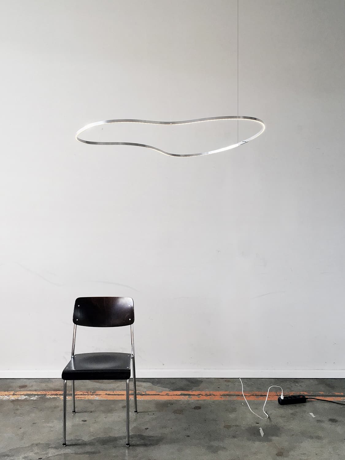 Fledge is a ceiling lamp made of anodized aluminium