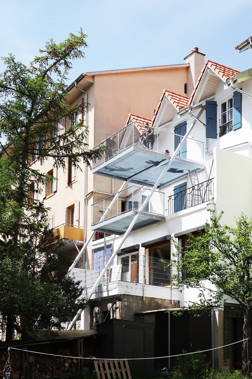 Sunset is the addition of winter gardens on a village house in Cernier, Switzerland